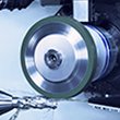 a mounted abrasive point on a straight grinder